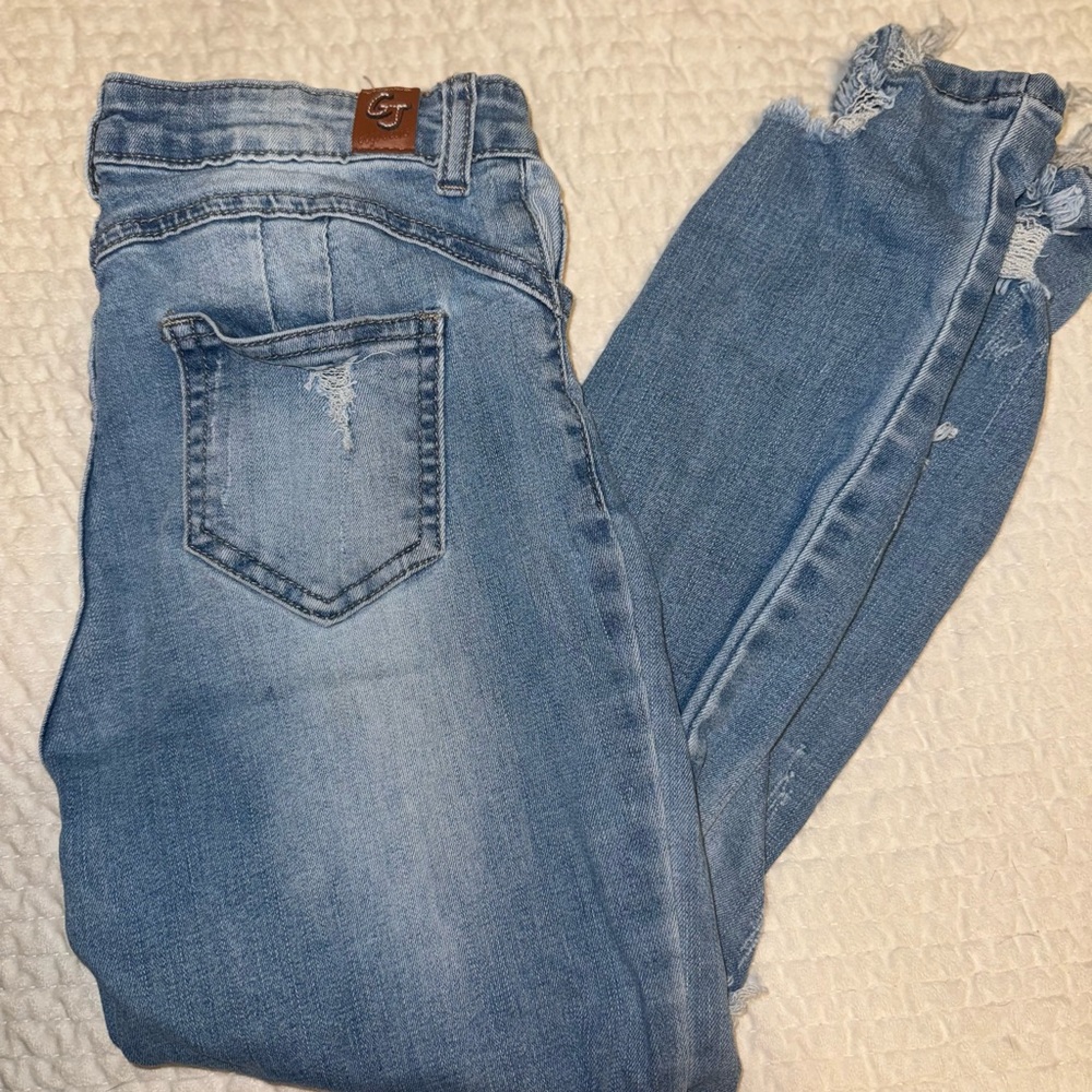 Light Wash Skinny Jeans with Frayed Hem - Women's